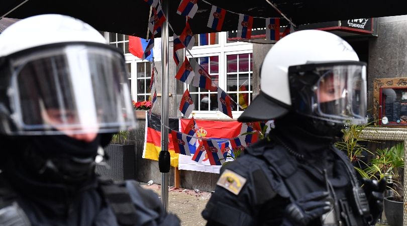 Riot police secure an area where a Serbia fan was attacked ahead of Serbia&#039;s game against England in Gelsenkirchen at Euro 2024.