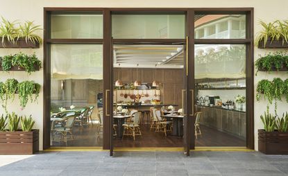 A view from outside looking into the Chef’s Table — Singapore