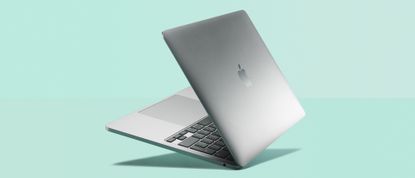 MacBook Pro 13-inch M1 on green background