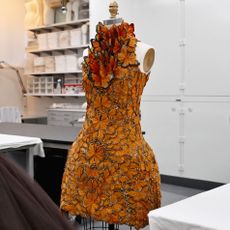 dress that looks like it's made of orange monarch butterflies