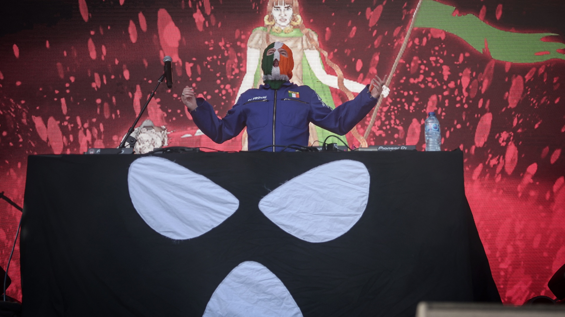 JJ O Dochartaigh, aka DJ Provai, part of the Irish hip-hop trio Kneecap, performs on stage at the Rock en Seine music festival, in Saint-Cloud, near Paris