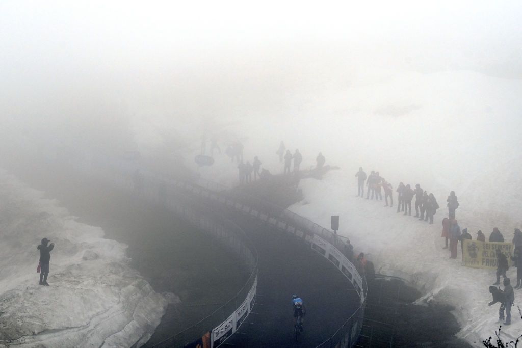 MONTE ZONCOLAN ITALY MAY 22 Lorenzo Fortunato of Italy and EOLOKOMETA Cycling Team in the Breakaway to win the stage during the 104th Giro dItalia 2021 Stage 14 a 205km stage from Cittadella to Monte Zoncolan 1730m Snow Fog UCIworldtour girodiitalia Giro on May 22 2021 in Monte Zoncolan Italy Photo by Stuart FranklinGetty Images