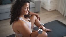 Woman exercising with a dumbbell