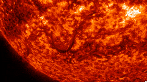 gif animation showing a fiery filament erupting from the sun.