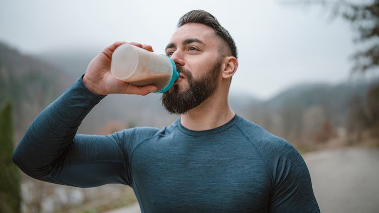 Man drinks a protein shake