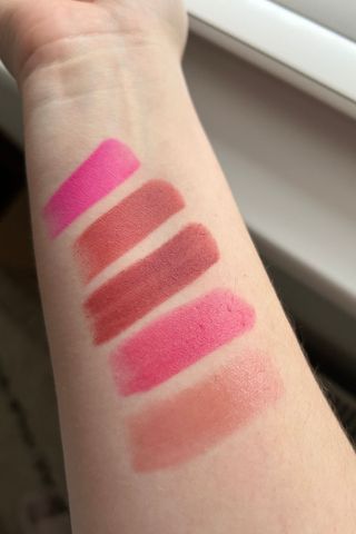 Swatches of the best pink lipsticks seen on Tori's arm