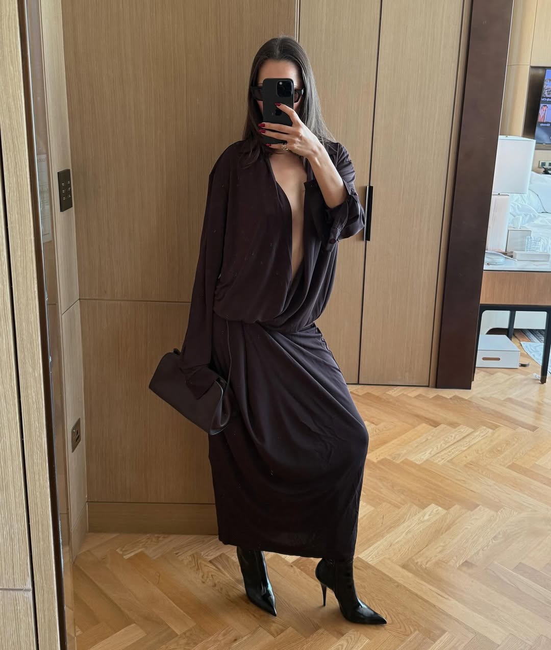 Pia Mance carrying The Row Peggy Clutch