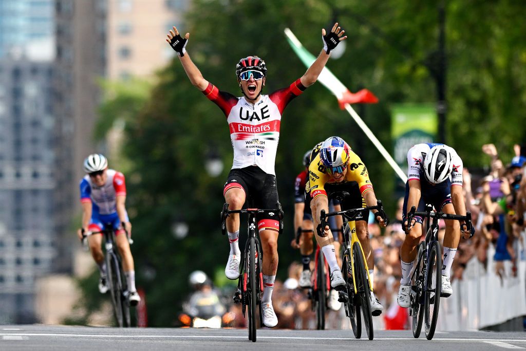 MONTREAL QUEBEC SEPTEMBER 11 Tadej Pogacar of Slovenia and UAE Team Emirates celebrates winning ahead of Wout Van Aert of Belgium and Team Jumbo Visma Andrea Bagioli of Italy and Team QuickStep Alpha Vinyl and David Gaudu of France and Team Groupama FDJ during the 11th Grand Prix Cycliste de Montreal 2022 a 221km one day race from Montreal to Montreal GPCQM WorldTour on September 11 2022 in Montreal Quebec Photo by Dario BelingheriGetty Images