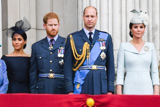 Meghan, Duchess of Sussex, Prince Harry, Duke of Sussex, Prince William, Duke of Cambridge and Catherine, Duchess of Cambridge stand on the balcony of Buckingham Palace