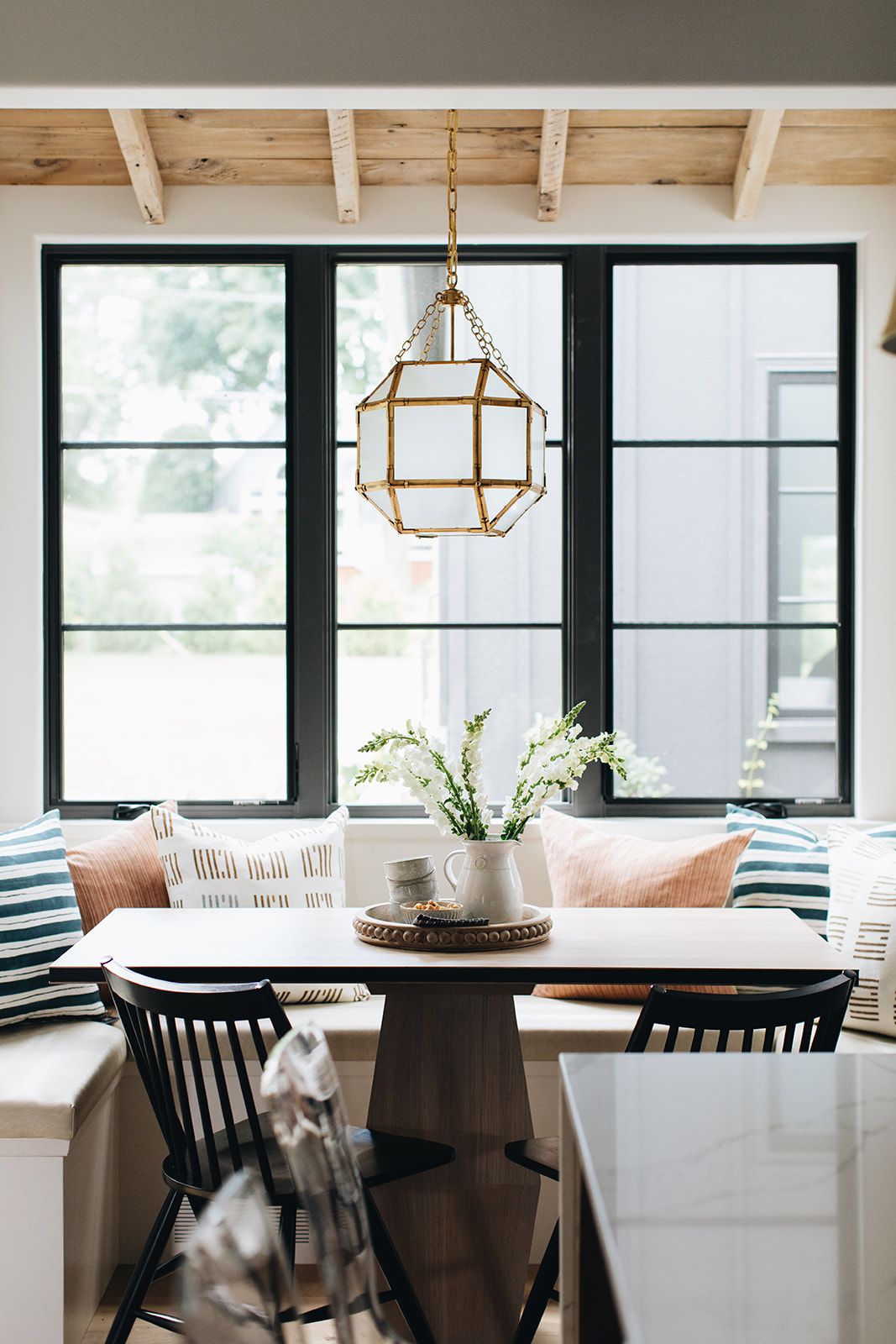 A banquette style seating area in a small kitchen