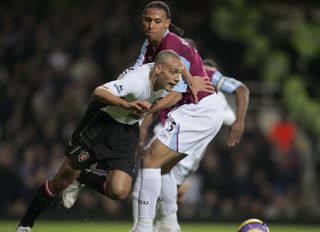 Rio and Anton Ferdinand clash during a game between Manchester United and West Ham in 2006.