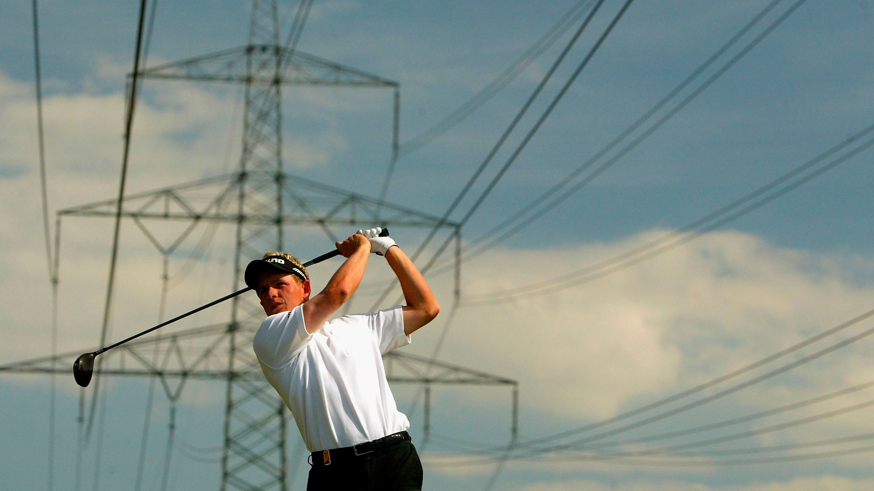 Luke Donald playing under power lines