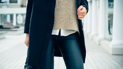 types of leggings: woman wearing faux leather leggings