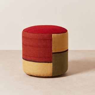 A color block pouf for the best sustainable furniture brands.