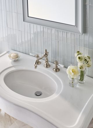 white bathroom tile with bathroom basin