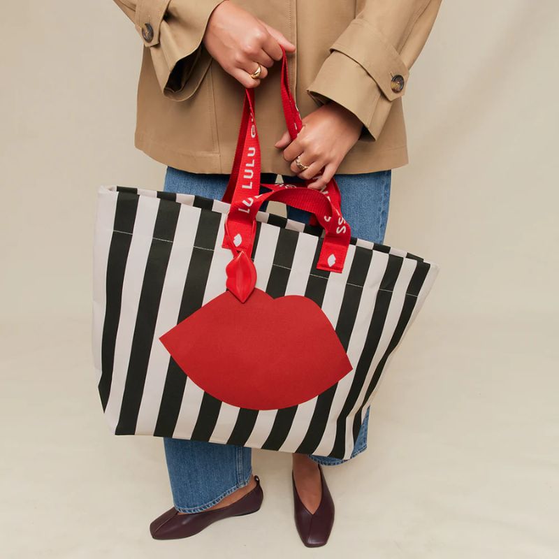 Black Multi Lulu Lip Striped Tote Bag carried by model
