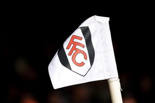 The Fulham badge on a white corner flag at Craven Cottage