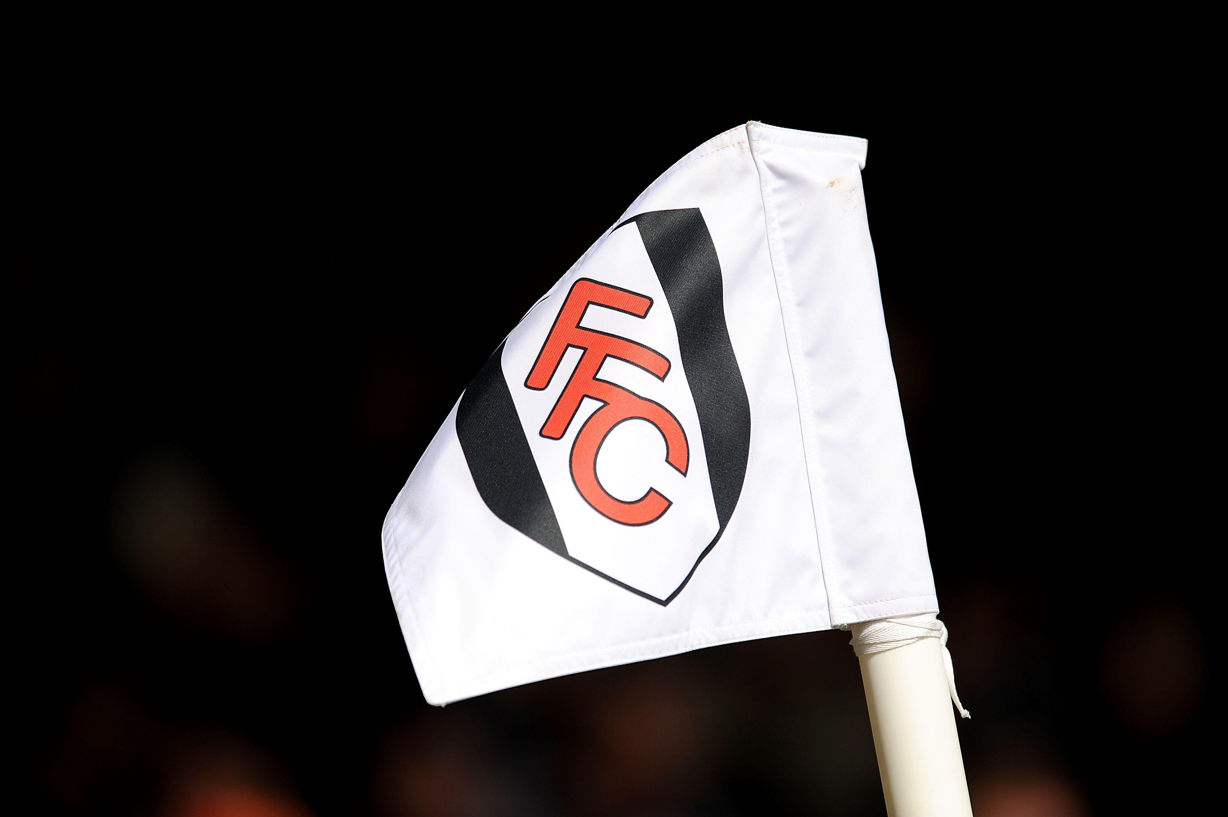 The Fulham badge on a white corner flag at Craven Cottage