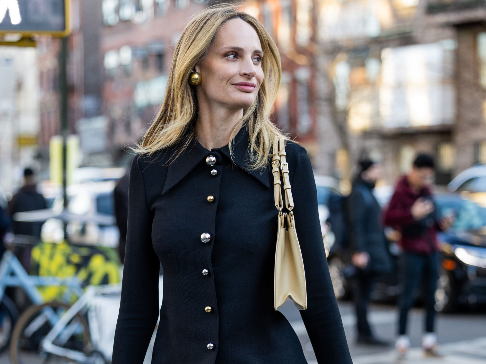Lauren Santo Domingo wears a black sweater