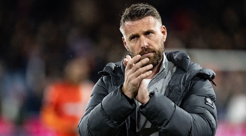 Luton Town manager Rob Edwards applauds the fans following a draw against Everton in May 2024.