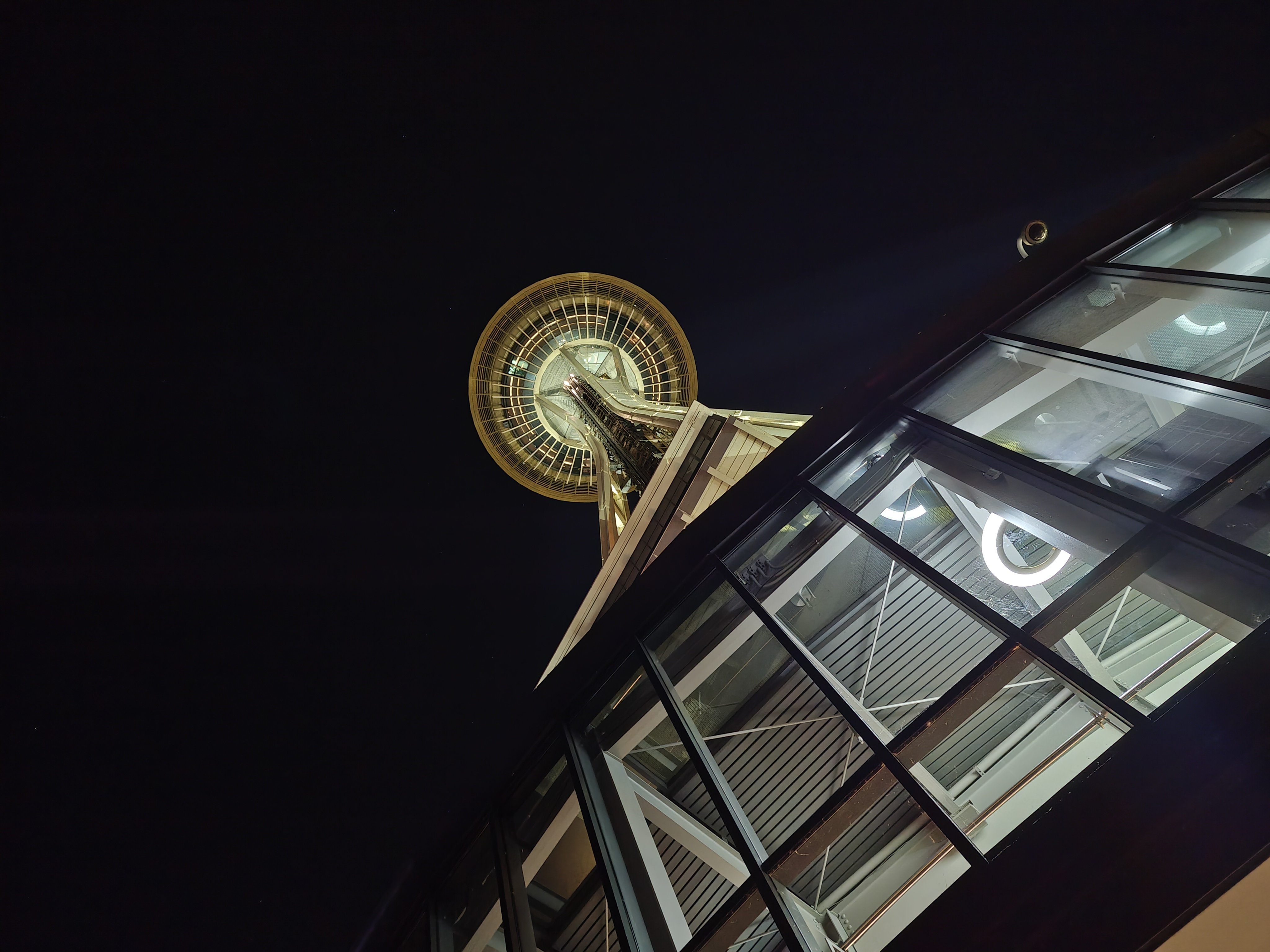 Underneath the Seattle Space Needle at night