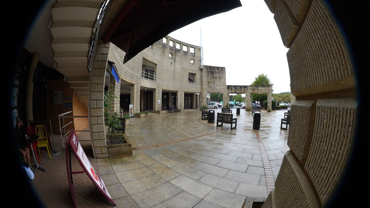 Distorted fisheye view of a forecourt of a cafe