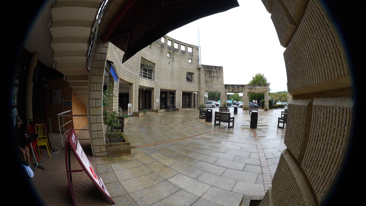 Distorted fisheye view of a forecourt of a cafe