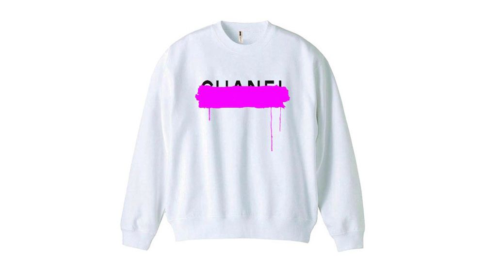 Chanel / Guanfi logo on a T-shirt
