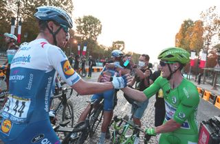 Deceuninck-QuickStep celebrate after clinching Sam Bennett's green jersey in Paris