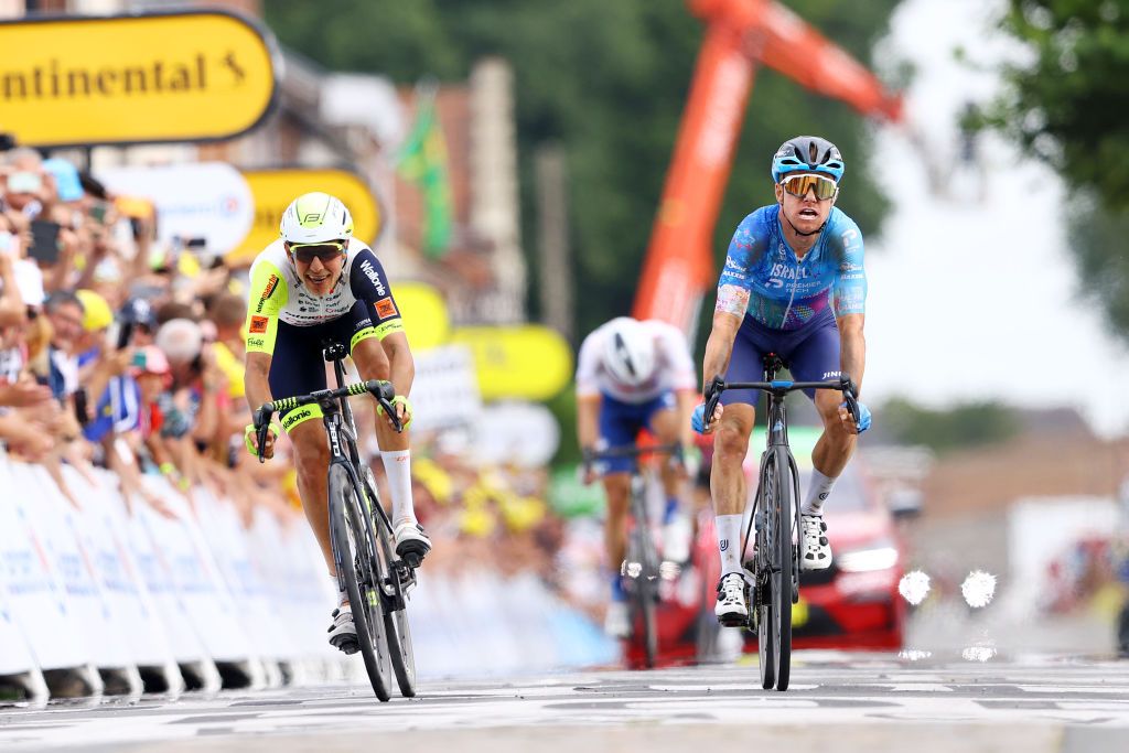 WALLERS FRANCE JULY 06 LR Taco Van Der Hoorn of Netherlands and Team Intermarch Wanty Gobert Matriaux and Simon Clarke of Australia and Team Israel Premier Tech sprint at finish line during to the 109th Tour de France 2022 Stage 5 a 157km stage from Lille to WallersArenberg TDF2022 WorldTour on July 06 2022 in Wallers France Photo by Michael SteeleGetty Images