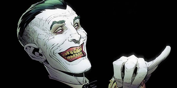 The Joker wearing a maniacal smile