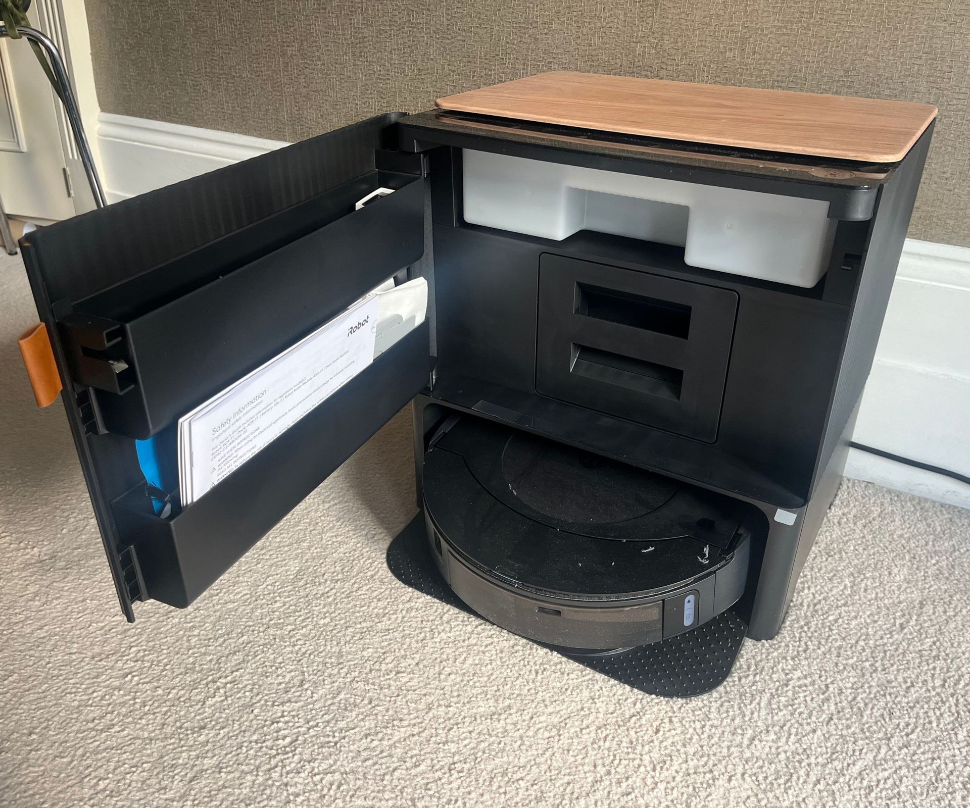 The view inside the the clean base of the iRobot Roomba j9+ Combo