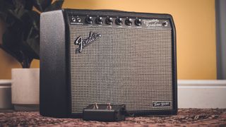 A Fender Princeton Reverb Tone Master amp with footswitch