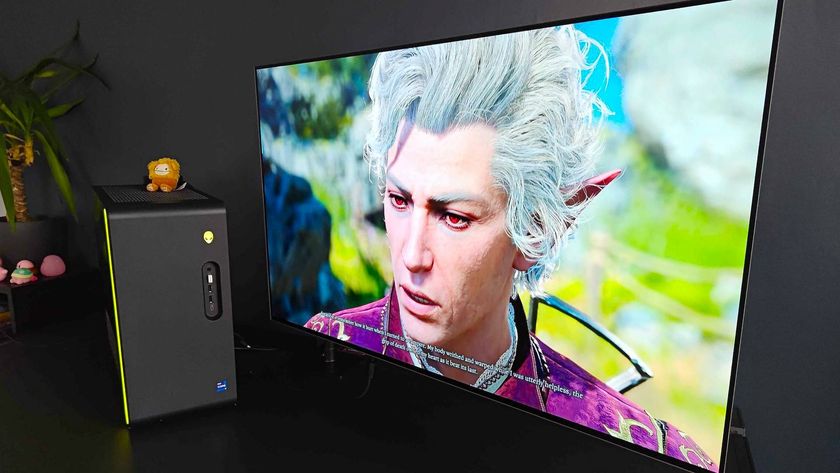 Alienware Aurora R16 PC next to Philips Evnia monitor with Astarion from Balder&#039;s Gate 3 on screen.