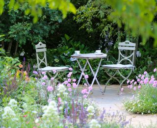 cottage garden patio ideas: bistro set on terrace