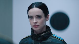 Krysten Ritter stands in uniform with a serious expression in Sonic the Hedgehog 3.