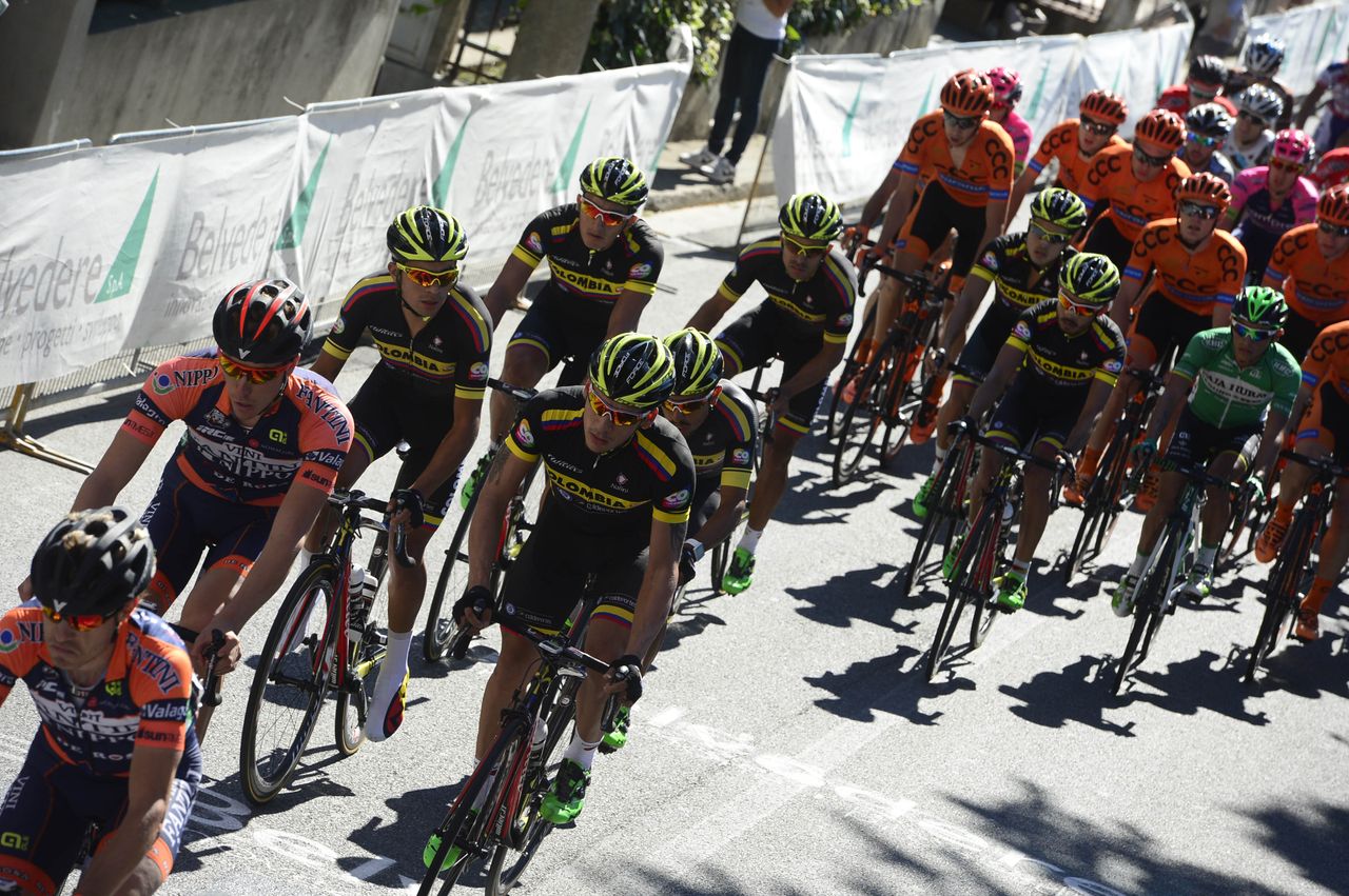 The peloton rides by