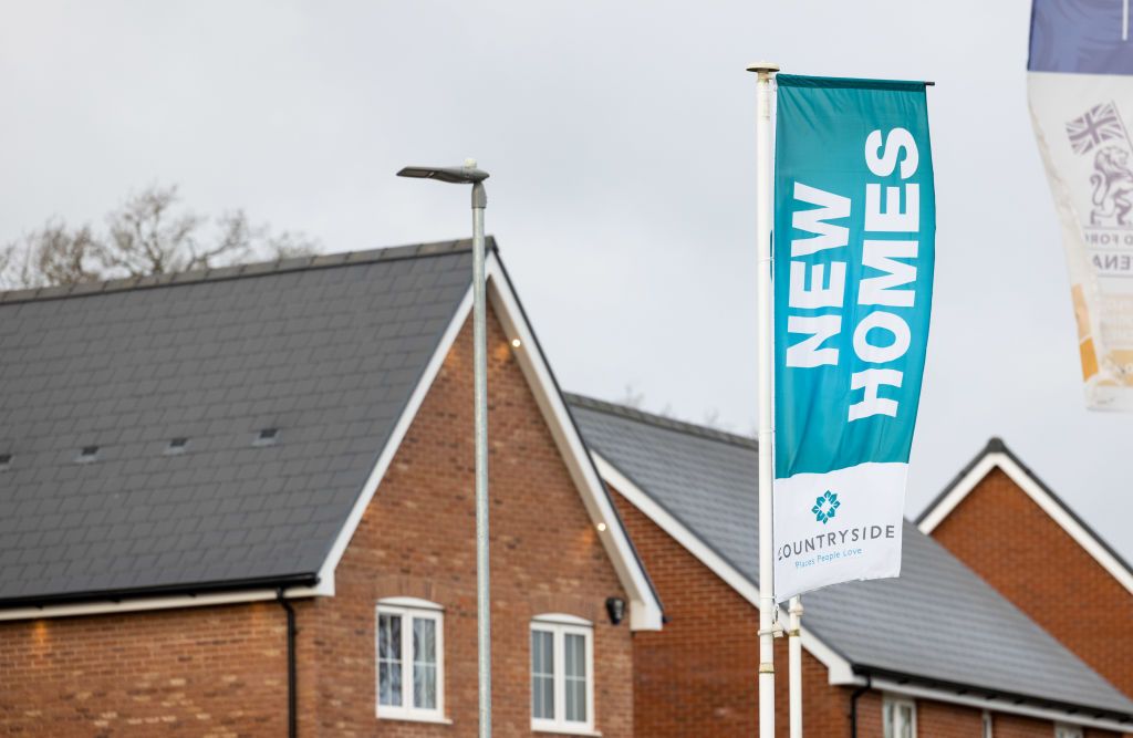 A flag advertising new homes for sale on a Countryside new build housing development in Braintree, UK