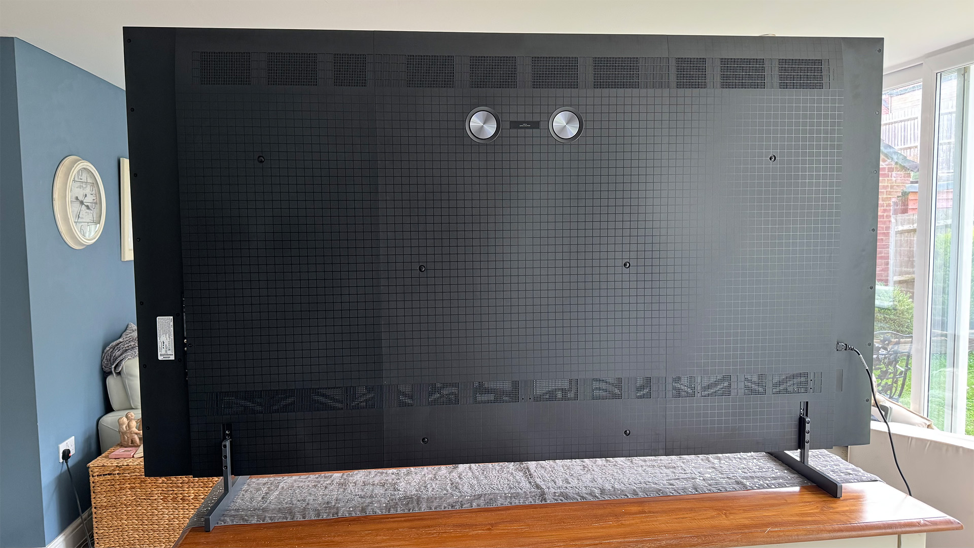 TCL 98C7K 98-inch TV on dining table, rear of TV set