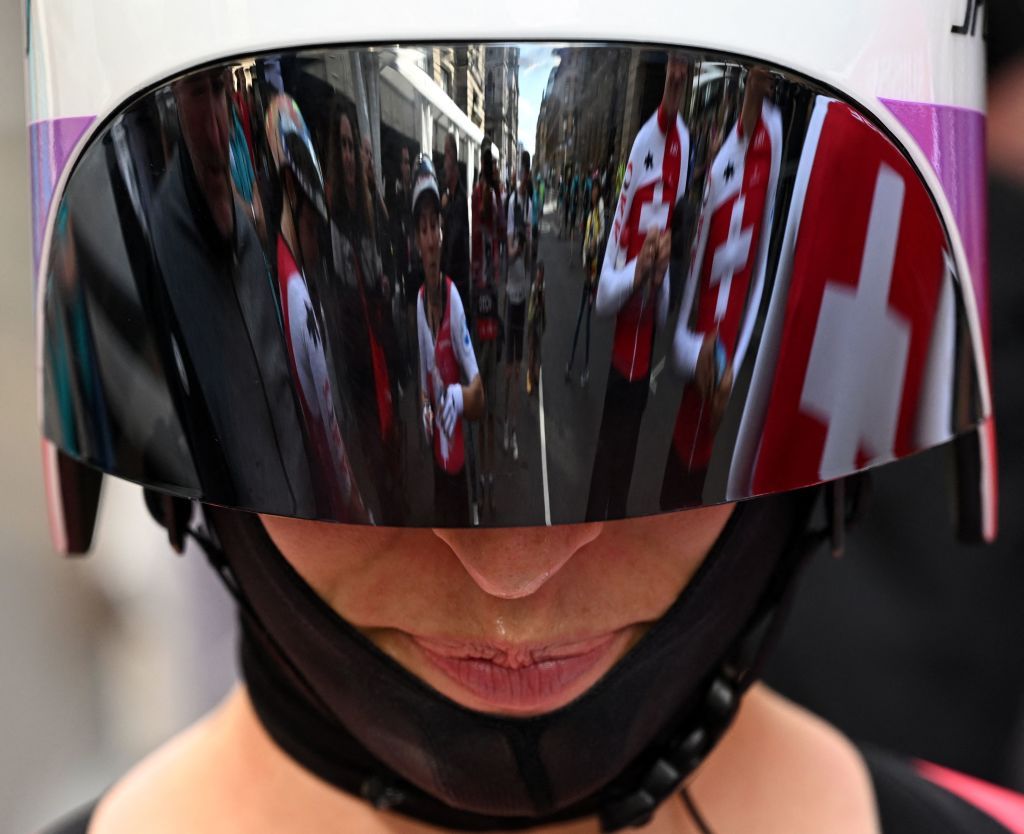 Riders from Switzerland celebrate winning gold in the Team Time Trial Mixed Relay road race during the UCI Cycling World Championships in Glasgow Scotland on August 8 2023 Photo by Oli SCARFF AFP Photo by OLI SCARFFAFP via Getty Images