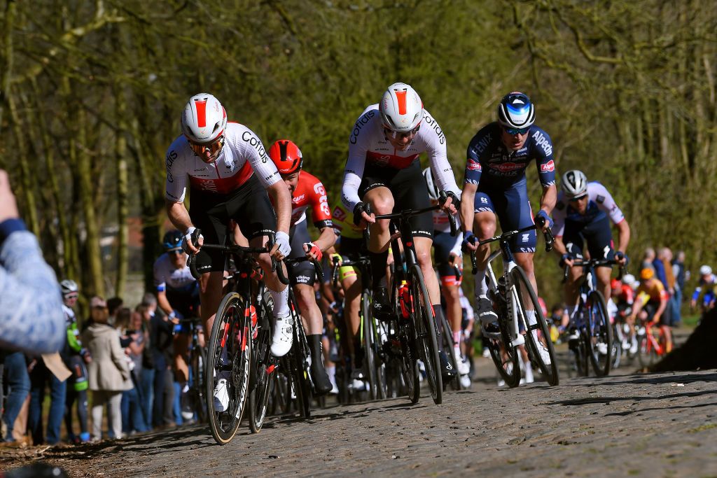 KOKSIJDE BELGIUM MARCH 18 LR Piet Allegaert of Belgium and Max Walscheid of Germany and Team Cofidis compete through cobblestones sector during the 20th Bredene Koksijde Classic 2022 a 2009km one day race from Bredene to Koksijde bredenekoksijde on March 18 2022 in Koksijde Belgium Photo by Luc ClaessenGetty Images