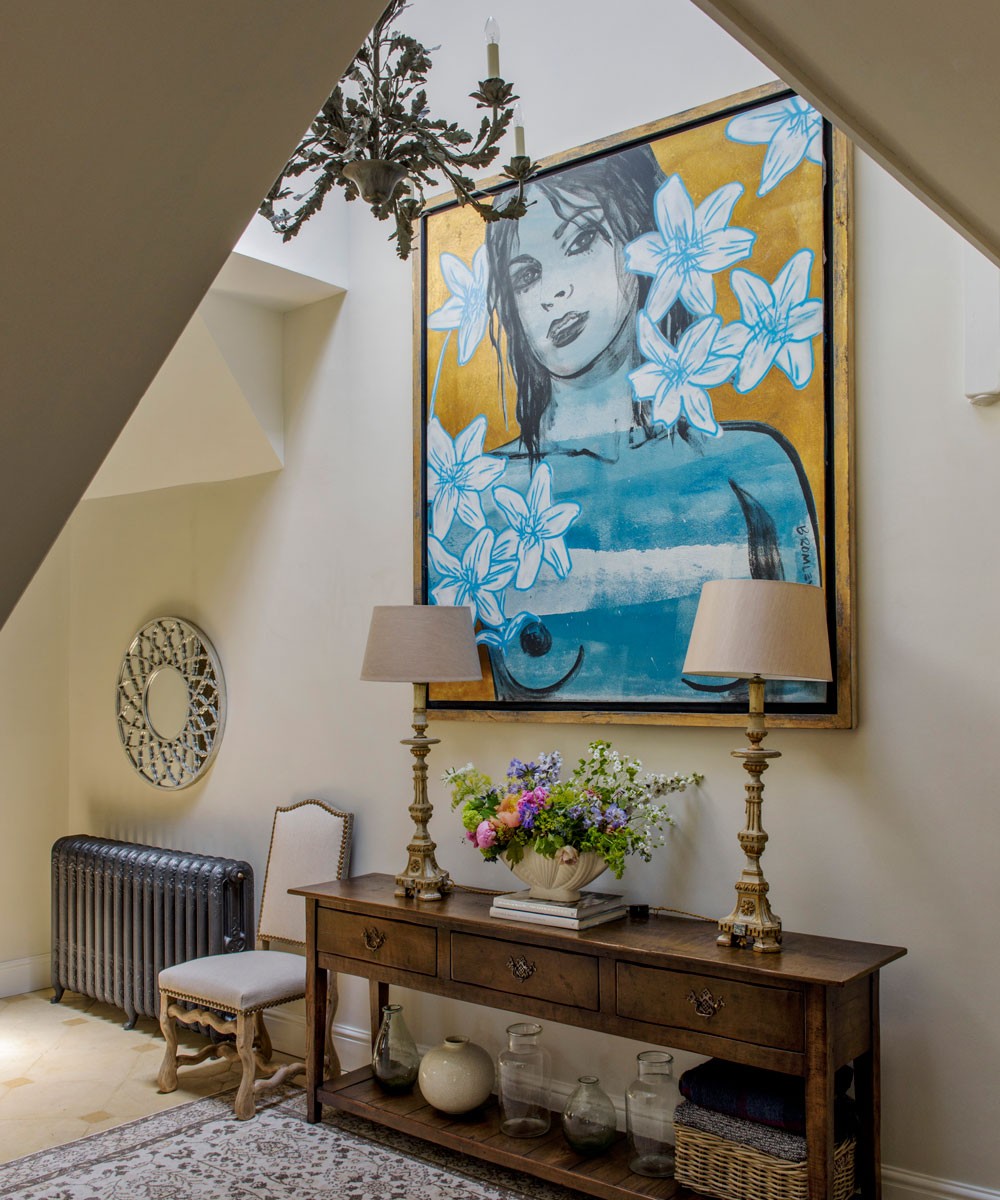 white hallway with large photo