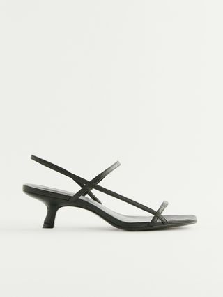 black two-strap heeled sandals