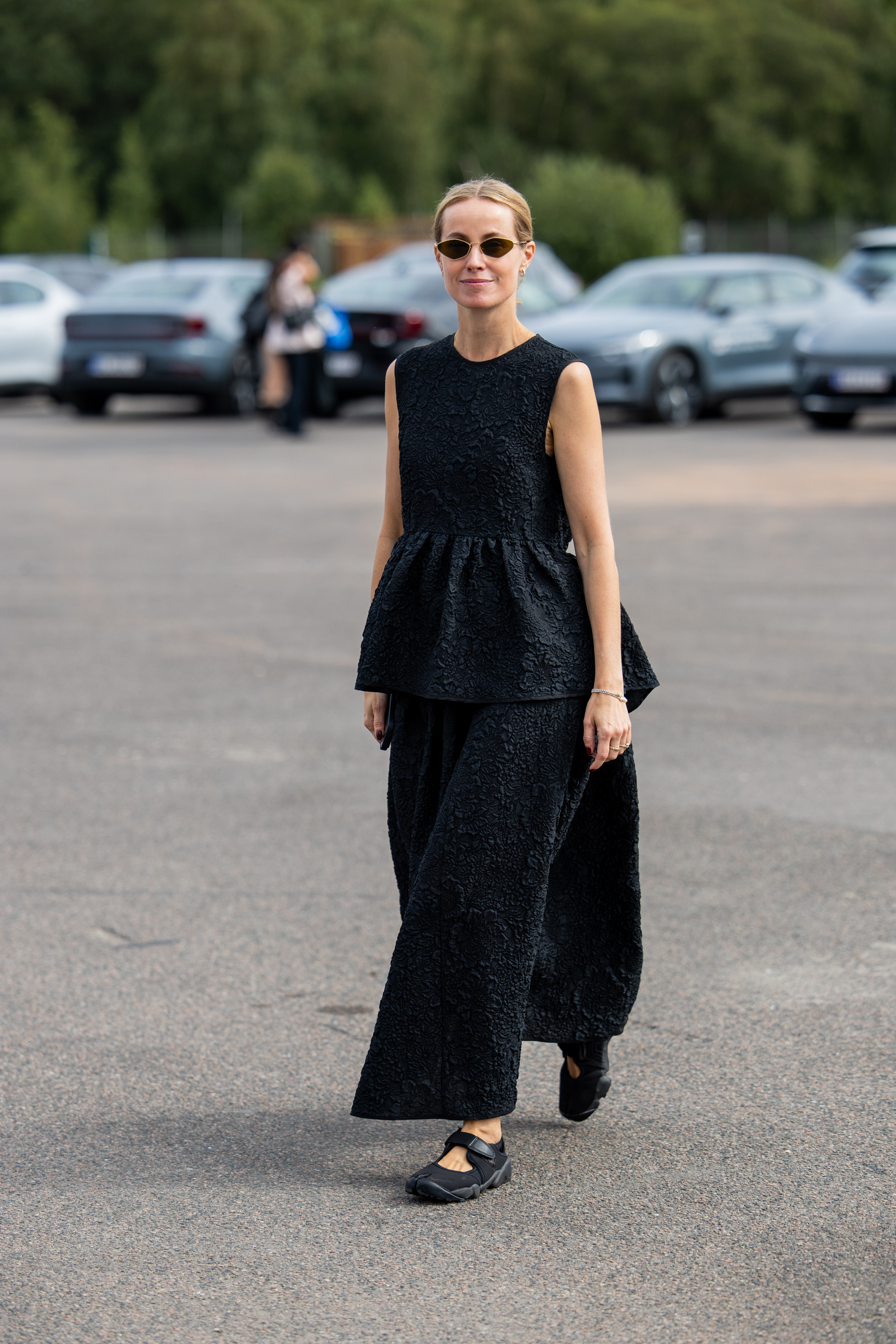 Cecilie Thorsmark wears black sleeveless top, pants outside Cecilie Bahnsen during Copenhagen Fashion Week day four on August 07, 2025 in Copenhagen,