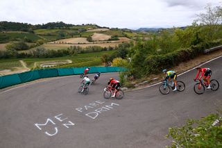 The breakaway tackle a hairpin bend earlier in the race