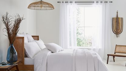 white bedding in light and bright bedroom