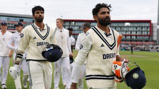 Ravindra Jadeja and Washington Sundar of India lead the team off after Day Five of the 4th Rothesay Test Match between England and India at Emirates Old Trafford on July 27, 2025 in Manchester, England.