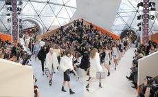 Female models on the runway of Louis Vuitton A/W 2015 fashion show with audience visible
