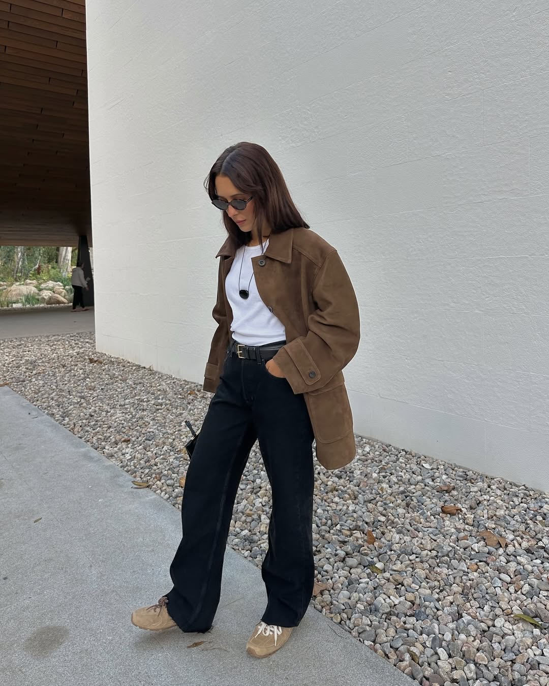 Debora wearing suede trainers