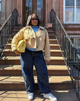 woman wearing white sneakers with spring denim outfit